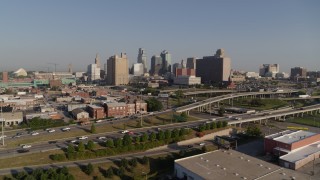 5.7K aerial stock footage flyby a freeway interchange east of city office buildings in Downtown Kansas City, Missouri Aerial Stock Footage | DX0001_001040