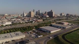 DX0001_001042 - 5.7K aerial stock footage approach freeway and city skyline in Downtown Kansas City, Missouri