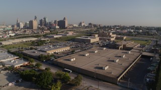 5.7K aerial stock footage fly away from adult education buildings to reveal skyline of Downtown Kansas City, Missouri Aerial Stock Footage | DX0001_001044