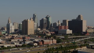 DX0001_001052 - 5.7K aerial stock footage a reverse view of city office building and skyscrapers in Downtown Kansas City, Missouri