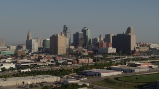 5.7K aerial stock footage fly away from city office building and skyscrapers in Downtown Kansas City, Missouri Aerial Stock Footage | DX0001_001053