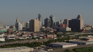 5.7K aerial stock footage approach freeway, office building and skyscrapers in Downtown Kansas City, Missouri Aerial Stock Footage | DX0001_001054