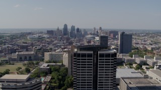 5.7K aerial stock footage of the city skyline seen from Crown Center, Downtown Kansas City, Missouri Aerial Stock Footage | DX0001_001083