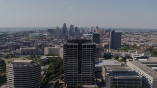 5.7K aerial stock footage static view of city skyline behind Crown Center office building, Downtown Kansas City, Missouri Aerial Stock Footage | DX0001_001088