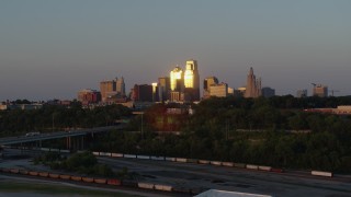 5.7K aerial stock footage of the skyline at sunset seen from west of the city, Downtown Kansas City, Missouri Aerial Stock Footage | DX0001_001169