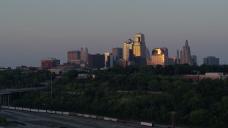 5.7K aerial stock footage of city high-rises reflecting the light of the twilight in Downtown Kansas City, Missouri Aerial Stock Footage | DX0001_001176