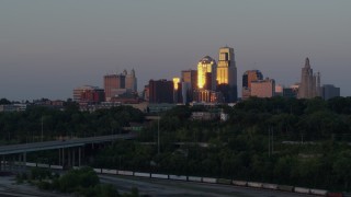 5.7K aerial stock footage flyby city high-rises reflecting the light of the twilight in Downtown Kansas City, Missouri Aerial Stock Footage | DX0001_001177