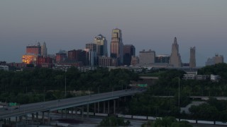 5.7K aerial stock footage flyby city skyline at twilight, seen from I-670, Downtown Kansas City, Missouri Aerial Stock Footage | DX0001_001188