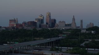 5.7K aerial stock footage of the I-670 freeway and city skyline at twilight in Downtown Kansas City, Missouri Aerial Stock Footage | DX0001_001192