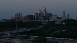 5.7K aerial stock footage reverse view of the skyline at twilight, Downtown Kansas City, Missouri Aerial Stock Footage | DX0001_001202