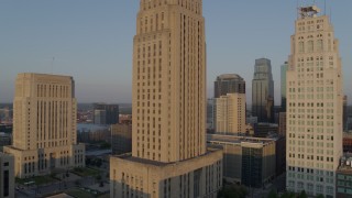 5.7K aerial stock footage approach city hall at sunrise, Downtown Kansas City, Missouri Aerial Stock Footage | DX0001_001211