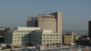 5.7K aerial stock footage flyby federal courthouse behind government office building at sunrise, Downtown Kansas City, Missouri Aerial Stock Footage | DX0001_001248