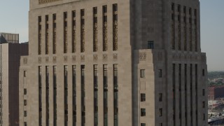 5.7K aerial stock footage of a reverse view of a tall courthouse building at sunrise, Downtown Kansas City, Missouri Aerial Stock Footage | DX0001_001251