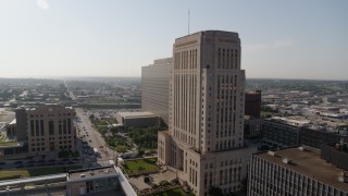 DX0001_001263 - 5.7K aerial stock footage flyby a courthouse at sunrise for view of government office building, Downtown Kansas City, Missouri