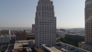 5.7K aerial stock footage of approaching a city skyscraper at sunrise, Downtown Kansas City, Missouri Aerial Stock Footage | DX0001_001272