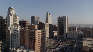 5.7K aerial stock footage of a group of city skyscrapers at sunrise, Downtown Kansas City, Missouri Aerial Stock Footage | DX0001_001274