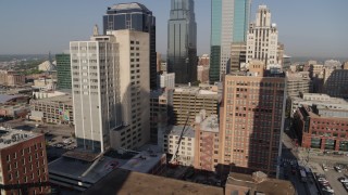 5.7K aerial stock footage orbit downtown office buildings and high-rises at sunrise, Downtown Kansas City, Missouri Aerial Stock Footage | DX0001_001282