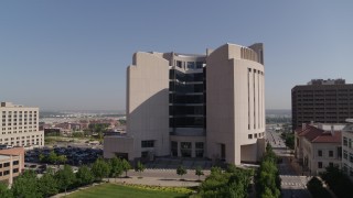 5.7K aerial stock footage circle the federal courthouse and hover for stationary view in Downtown Kansas City, Missouri Aerial Stock Footage | DX0001_001307