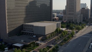 5.7K aerial stock footage of a reverse view of a government office building in Downtown Kansas City, Missouri Aerial Stock Footage | DX0001_001325