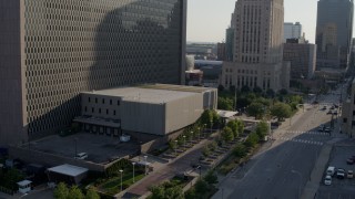 5.7K aerial stock footage stationary and reverse view of entrance to a government office building in Downtown Kansas City, Missouri Aerial Stock Footage | DX0001_001327