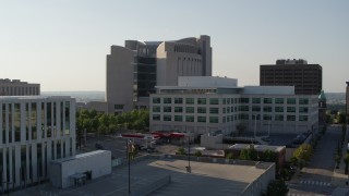 5.7K aerial stock footage passing federal courthouse behind office building in Downtown Kansas City, Missouri Aerial Stock Footage | DX0001_001334