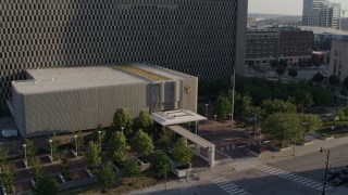 5.7K aerial stock footage fly away from entrance of government office building in Downtown Kansas City, Missouri Aerial Stock Footage | DX0001_001336