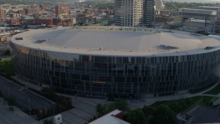 5.7K aerial stock footage of a close orbit of an arena at sunset in Downtown Kansas City, Missouri Aerial Stock Footage | DX0001_001344