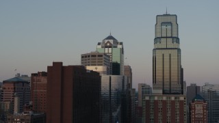 5.7K aerial stock footage of light reflecting off of skyscrapers at sunset in Downtown Kansas City, Missouri Aerial Stock Footage | DX0001_001354