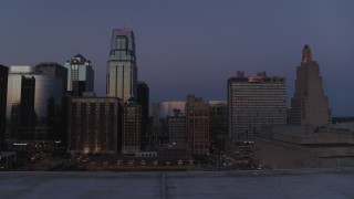 5.7K aerial stock footage ascend with a view of a hotel and skyscrapers at twilight in Downtown Kansas City, Missouri Aerial Stock Footage | DX0001_001393