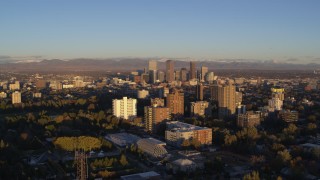 5.7K aerial stock footage of downtown skyscrapers seen from apartment complexes at sunrise, Downtown Denver, Colorado Aerial Stock Footage | DX0001_001405