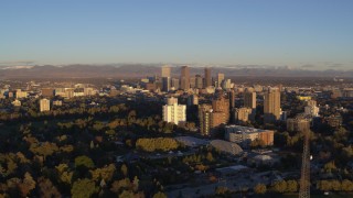 5.7K aerial stock footage of downtown skyscrapers and apartment complexes at sunrise, Downtown Denver, Colorado Aerial Stock Footage | DX0001_001406