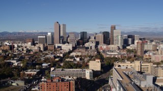 5.7K aerial stock footage a reverse view of skyscrapers in Downtown Denver, Colorado, seen while descending Aerial Stock Footage | DX0001_001438