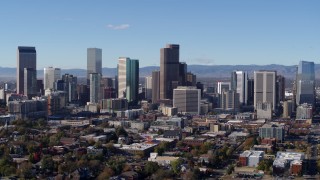 DX0001_001459 - 5.7K aerial stock footage reverse and flyby skyscrapers in Downtown Denver skyline, Colorado