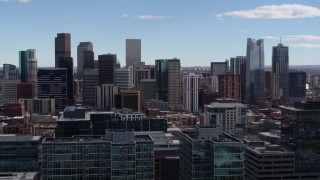 DX0001_001505 - 5.7K aerial stock footage of the city's skyline seen from office buildings in Downtown Denver, Colorado