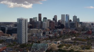 5.7K aerial stock footage flyby the city's skyline and a residential skyscraper in Downtown Denver, Colorado Aerial Stock Footage | DX0001_001515