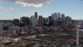 DX0001_001517 - 5.7K aerial stock footage of a view of skyline while making a slow descent in Downtown Denver, Colorado