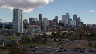 5.7K aerial stock footage of a stationary view of a residential skyscraper and city skyline in Downtown Denver, Colorado Aerial Stock Footage | DX0001_001518