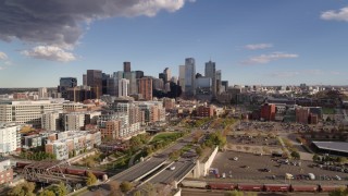 5.7K aerial stock footage of the city skyline in the distance, Downtown Denver, Colorado Aerial Stock Footage | DX0001_001537