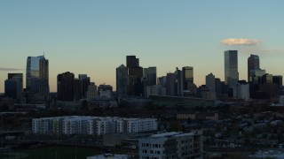 5.7K aerial stock footage of passing tall skyscrapers in the city skyline at sunset, Downtown Denver, Colorado Aerial Stock Footage | DX0001_001555