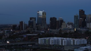 5.7K aerial stock footage of flyby skyscrapers and hotel high-rise at twilight, Downtown Denver, Colorado Aerial Stock Footage | DX0001_001588