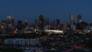 5.7K aerial stock footage of the convention center and city skyline at twilight, Downtown Denver, Colorado Aerial Stock Footage | DX0001_001603