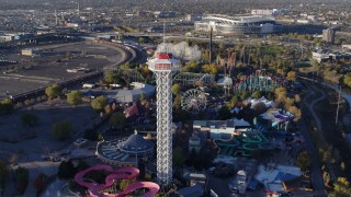 5.7K aerial stock footage of flying by rides at Elitch Gardens at sunrise in Downtown Denver, Colorado Aerial Stock Footage | DX0001_001636