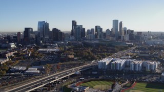 5.7K aerial stock footage flyby the city skyline at sunrise in Downtown Denver, Colorado Aerial Stock Footage | DX0001_001638