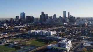 5.7K aerial stock footage of a view of the city skyline at sunrise in Downtown Denver, Colorado Aerial Stock Footage | DX0001_001640