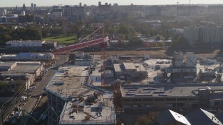 5.7K aerial stock footage orbit a crane atop a building under construction at sunrise in Downtown Denver, Colorado Aerial Stock Footage | DX0001_001650