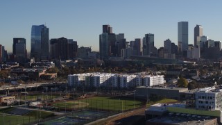 5.7K aerial stock footage flyby skyscrapers in the city's skyline at sunrise in Downtown Denver, Colorado Aerial Stock Footage | DX0001_001654