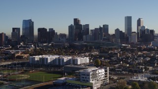 5.7K aerial stock footage approach and flyby the city's skyline at sunrise in Downtown Denver, Colorado Aerial Stock Footage | DX0001_001656