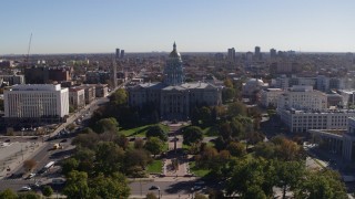 5.7K aerial stock footage ascend from park for stationary view of the Colorado State Capitol, Downtown Denver, Colorado Aerial Stock Footage | DX0001_001684