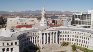 DX0001_001695 - 5.7K aerial stock footage of passing the Denver City Council building while ascending, Downtown Denver, Colorado