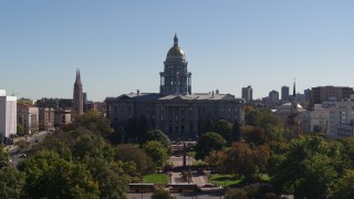 5.7K aerial stock footage of passing by the Colorado State Capitol during ascent, Downtown Denver, Colorado Aerial Stock Footage | DX0001_001706